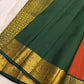 Rust orange Kancheepuram pure silk saree with maanga butta and mayil border on banana leaf — Idam Living
