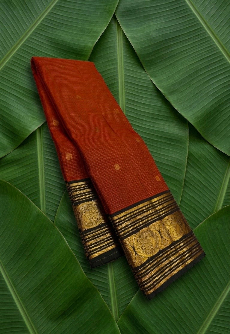 Sorgavasal pallu on rust orange Kanjeevaram pure silk saree — Idam Living