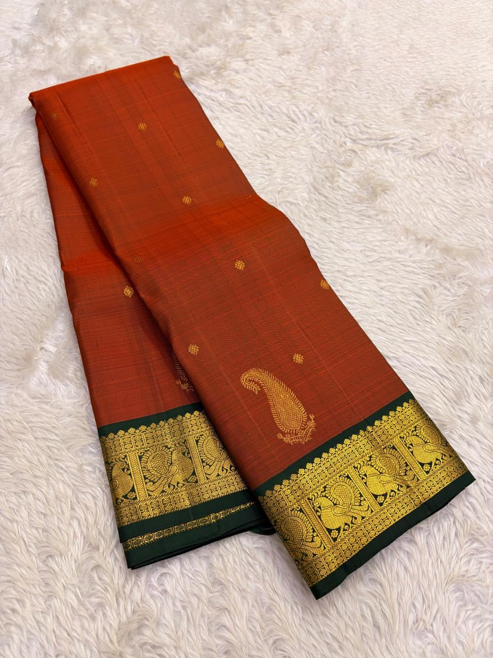 Maanga butta paisley motif in gold zari on rust orange Kanchipuram pure silk saree — Idam Living