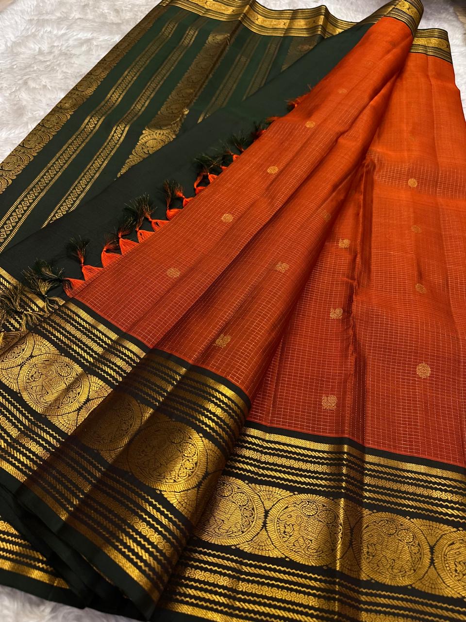 Deep black korvai sorgavasal peacock border on rust orange Kanjeevaram pure silk saree — Idam Living