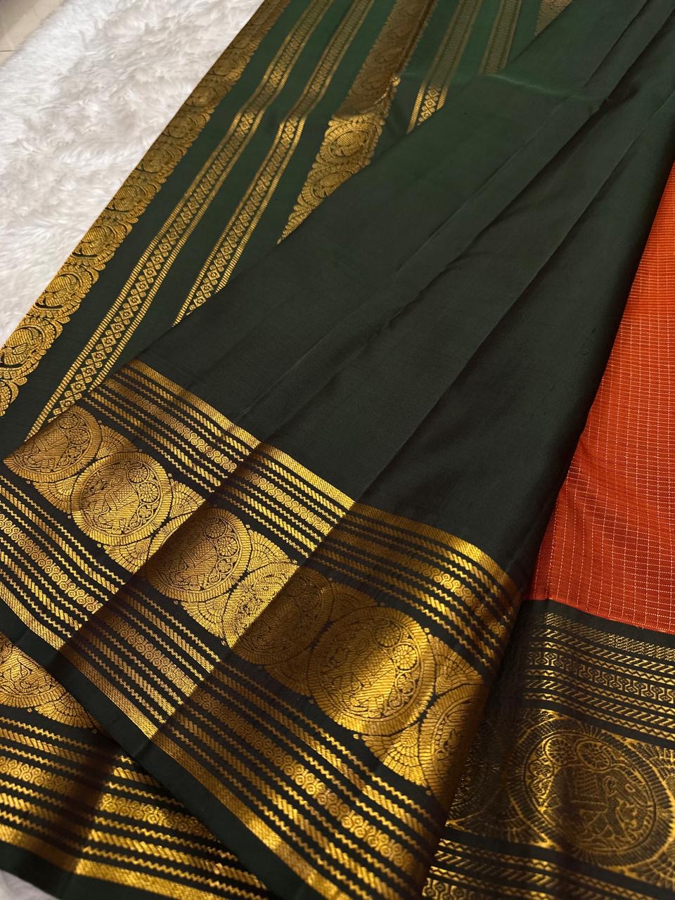 Full view of rust orange handwoven Kanchipuram pure silk saree with zari kattam and sorgavasal border — Idam Living
