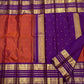 Kathiripoo Purple Kanchipuram silk body with small individual gold zari buttas.