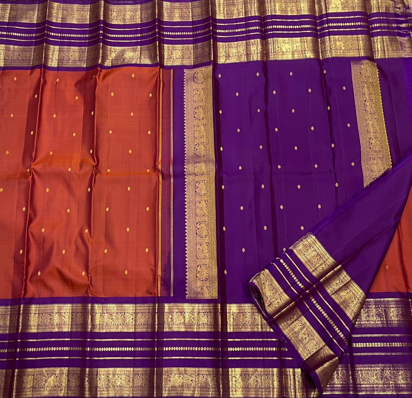 Kathiripoo Purple Kanchipuram silk body with small individual gold zari buttas.