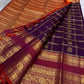 Dense vanasringaram gold zari border on rust orange korvai of chocolate brown Kanchipuram saree — Idam Living