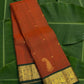 Rust orange handwoven Kanchipuram pure silk saree with maanga butta and forest green mayil border — Idam Living