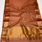 Rust terracotta Katan Silk Chanderi saree draped to show body and border
