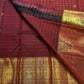 Gandaberunda gold zari border on maroon Zari Kattam saree
