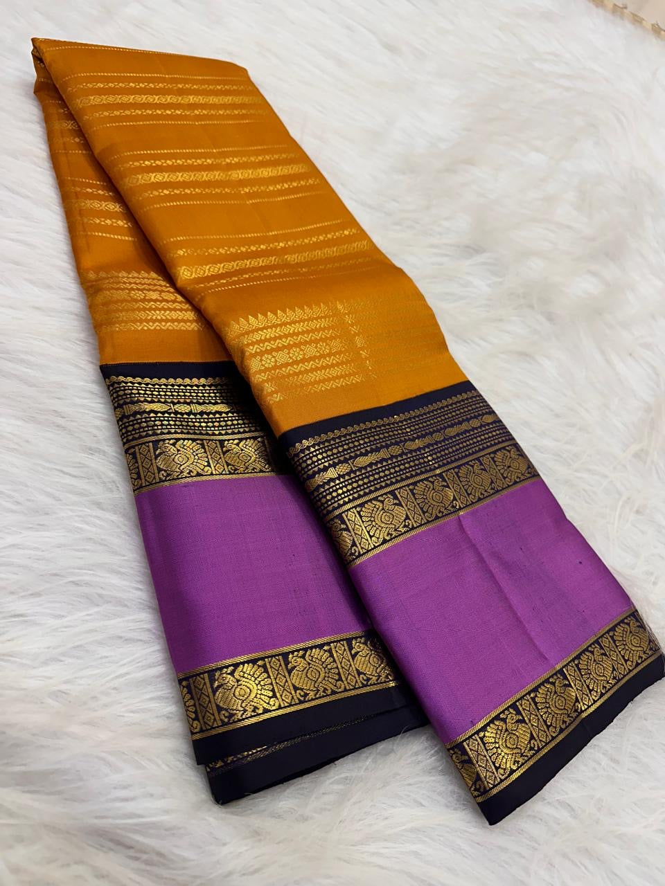Saffron Marigold Handwoven Pure Silk Kanjipuram Korvai Saree with Orchid Purple Border and Veldhari Zari