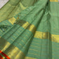 Sage Green pure mulberry silk Varisaipet saree with gold zari lines and Burnt Orange selvedge.