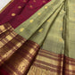 Deep red Vanasringaram gold zari border of sage green Kanjipuram pure silk saree with elephant procession motif