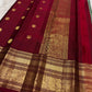 Detail of ornate gold zari Yaanai Ambari elephant procession Butta woven across sage green Kanjipuram silk body