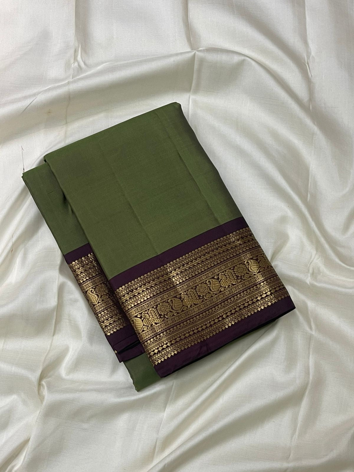 Sage green Kanchi Pattu silk saree with plum varisaipet border and gold zari rows — Idam Living