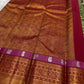 Gold zari detail on sage green Kanchi Pattu silk saree