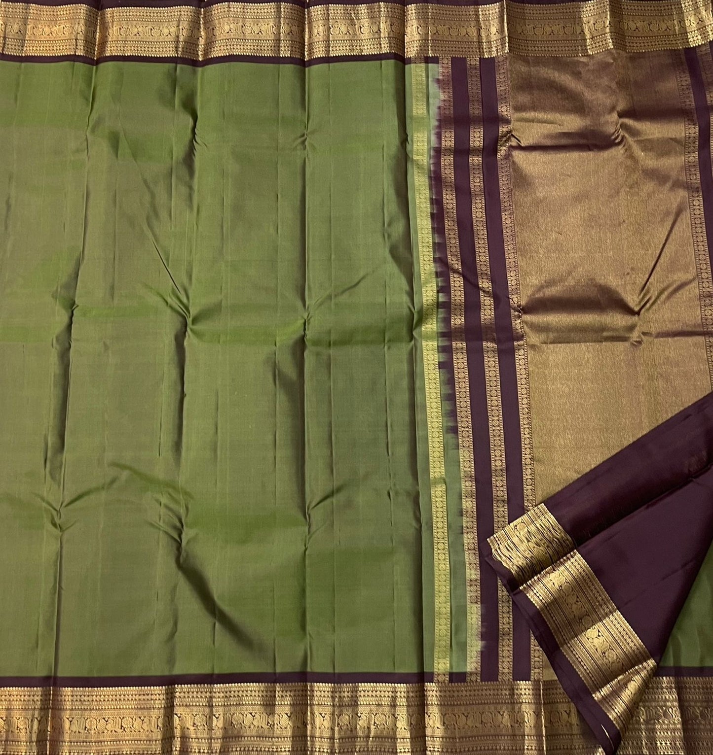 Sage green Kanjeevaram silk saree with traditional plum border and gold zari pallu — Idam Living