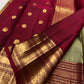 Rich deep red Vanasringaram gold zari pallu of sage green Kanjipuram pure silk saree