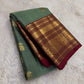 Sage green Kanjivaram saree with burgundy red border and gold zari yaanai ambari butta – detail view