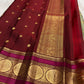 maroon border detail of sage green Kanchipuram silk saree