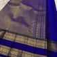 Rich zari pallu on the sage green pure mulberry silk Kanchipuram saree.