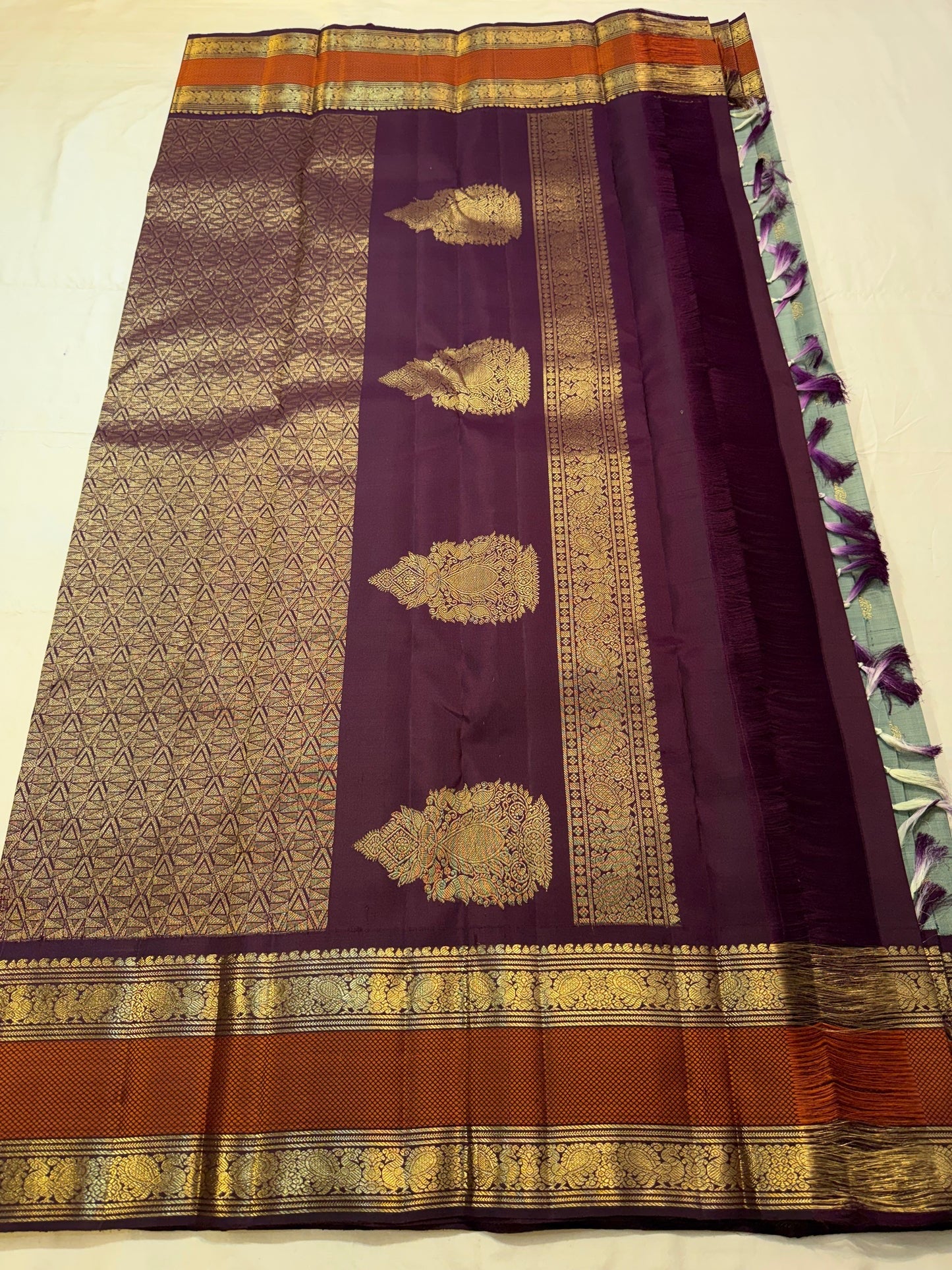 Rich rettapet gold zari pallu on sage green handwoven Kanchipuram saree — Idam Living