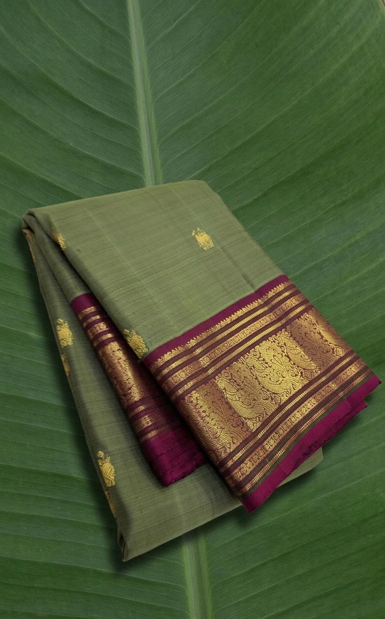 Sage leaf green and raspberry wine handwoven Kanjivaram silk saree with korvai small butta border – Idam Living