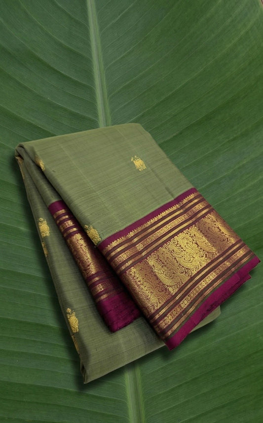 Sage leaf green and raspberry wine handwoven Kanjivaram silk saree with korvai small butta border – Idam Living