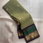 Sage olive green pure silk KanchiPattu saree with gold zari Butta motifs, full drape view