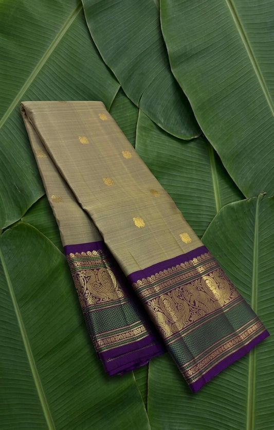 Sage olive handwoven pure silk Kanchipuram saree with Varisaipet Mayil butta border — full folded overview