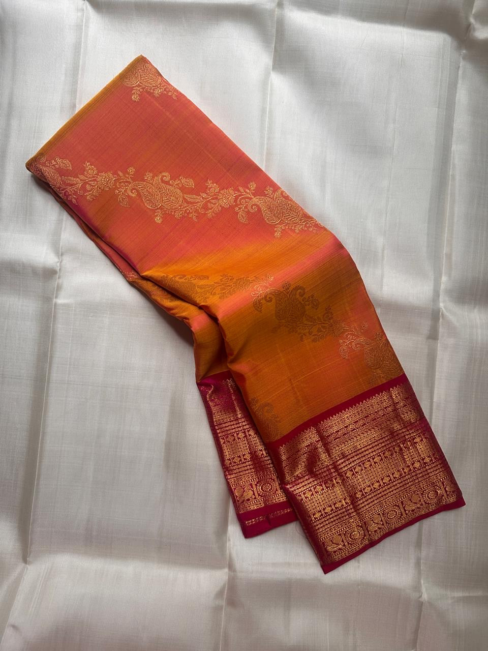Floral creeper and ornamental gold-zari butta on the Sampangi Gold Kanchipuram silk.