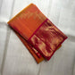 Sampangi Gold Kanchipuram Butta saree with Rani Pink gold-zari border.