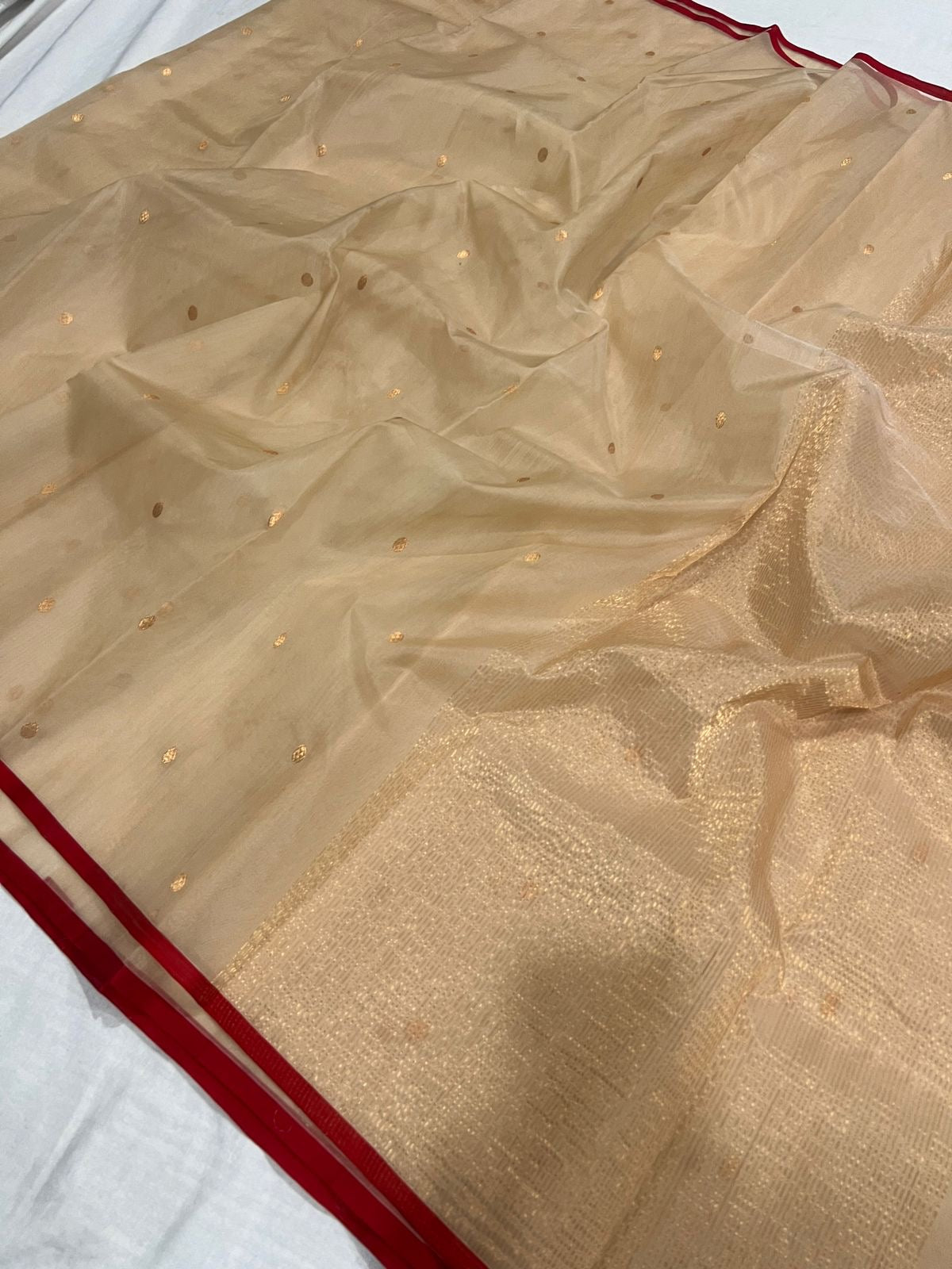 Sandalwood beige handloom Chanderi Katan Silk saree with gold woven buttas, deep red border and fine zari pallu