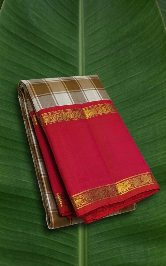 Sandalwood-toned caramel checks Kanchipuram silk saree with coral red rettapet border and traditional zari detailing