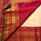 Warm Sandalwood Ivory pure silk Kanjeevaram Korvai saree with Arakku Red border.