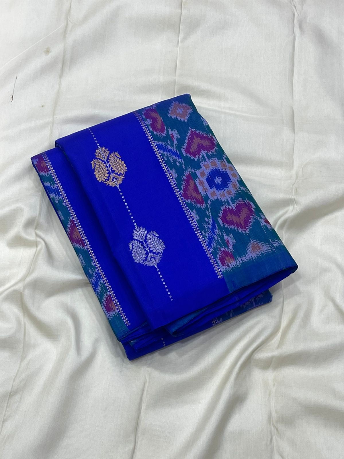 Sapphire Blue Handwoven Pure Silk KanchiPattu Saree with Pochampally Butta and Ikat Border