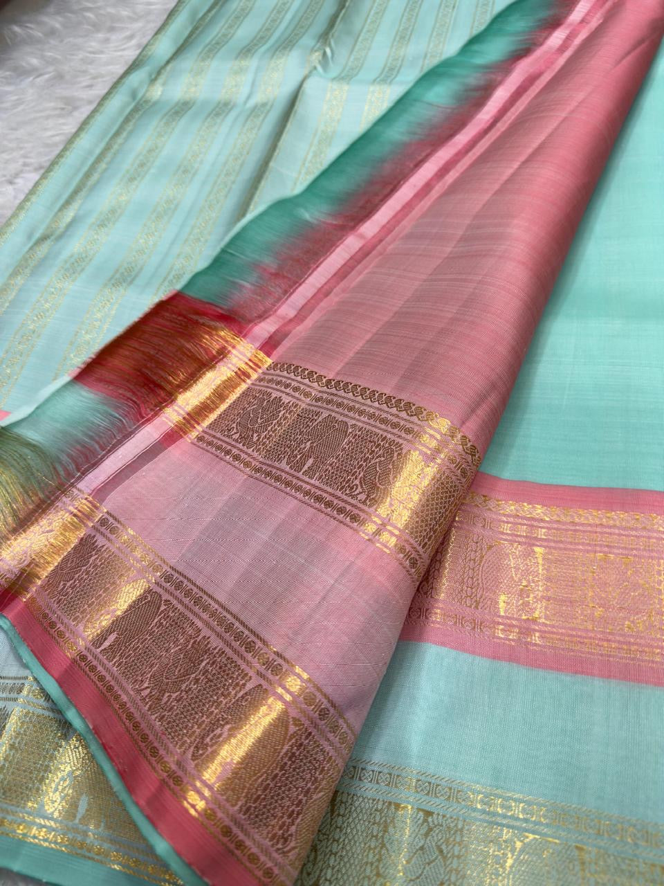 Sea-Glass Aqua Handwoven Pure Silk Kanchipuram Saree with Coral-Rose Rettapet Border and Gold Zari Buttas
