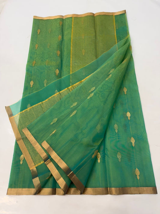 Close-up of Sea Green Chanderi Katan Silk saree showing fine gold-toned buttas woven along the body