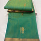 Folded Sea Green Katan Silk Chanderi saree showing gold woven buttas and fine antique-gold border