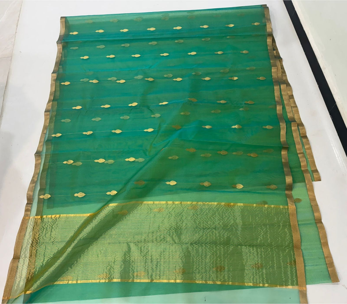Sea Green handloom Chanderi Katan Silk saree with fine gold buttas, slim antique-gold border and striped zari pallu
