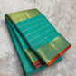 Turquoise Sea Green Kanchipuram silk saree with small spaced antique-gold zari buttas.