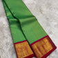 Sea-green Zari Kattam silk with rani pink gold brocade border and contrasting coral pallu