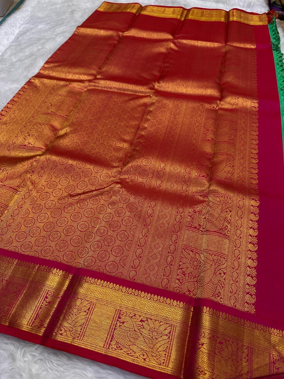 Rani pink Kanchipuram saree border with wide gold framed brocade panels
