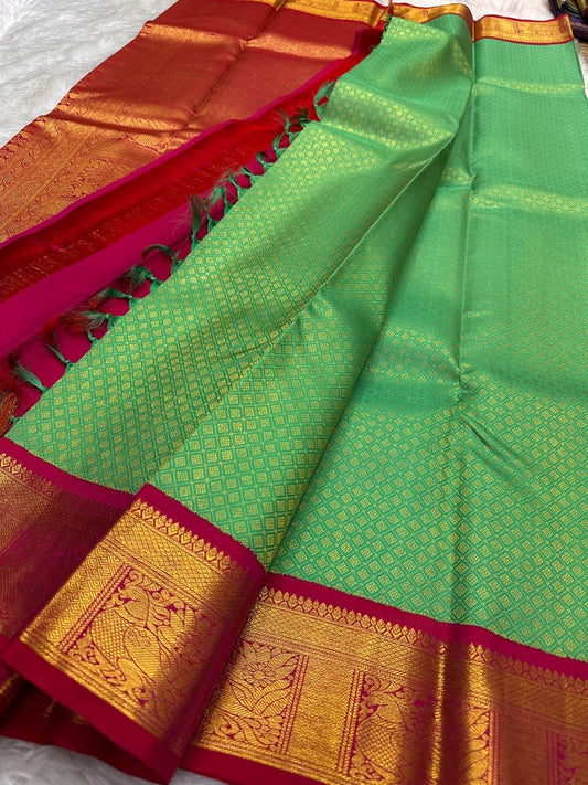 Tiny gold zari grid woven throughout fresh aqua-green Kanjeevaram pure silk body