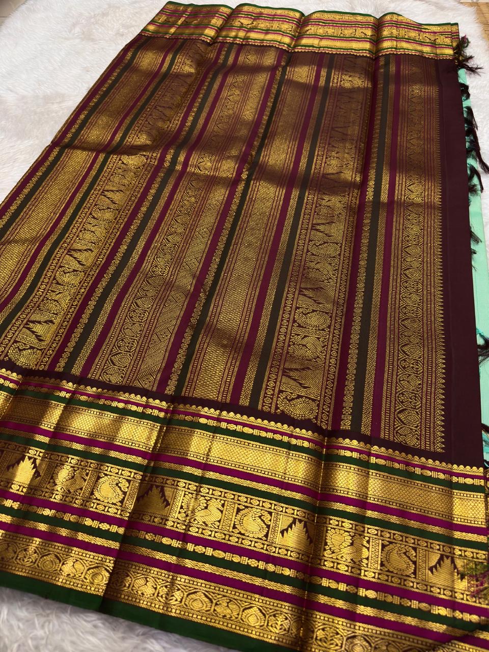 Seafoam green pure silk Kanchi Pattu saree with deep green Varisaipet border — full overview, Idam Living