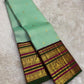 Deep green and magenta Varisaipet border with peacock and elephant zari bands in antique gold