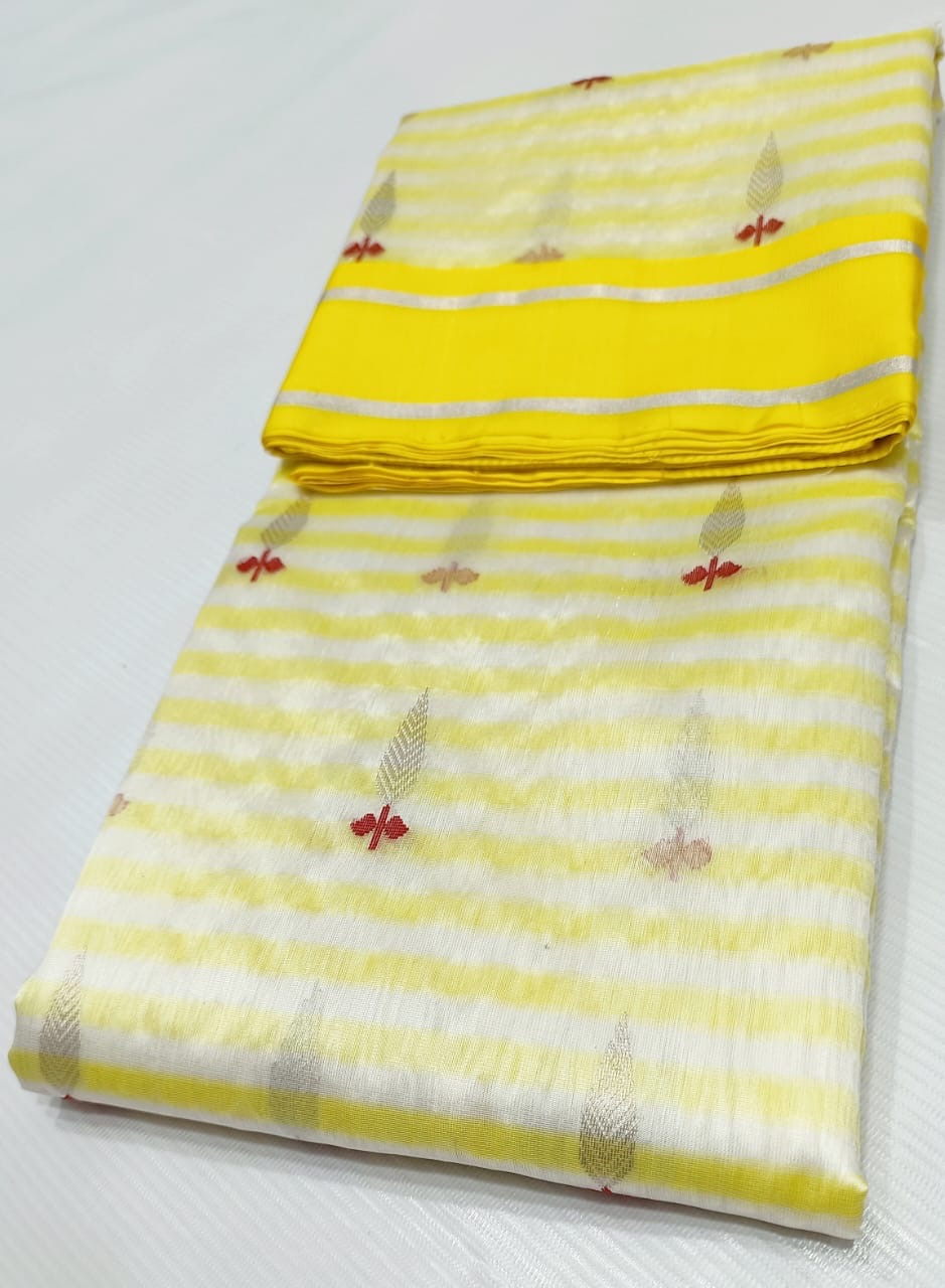 Moonlit ivory and marigold yellow Chanderi Pattu Silk saree, alternate view of the luminous ivory body and botanical motifs.