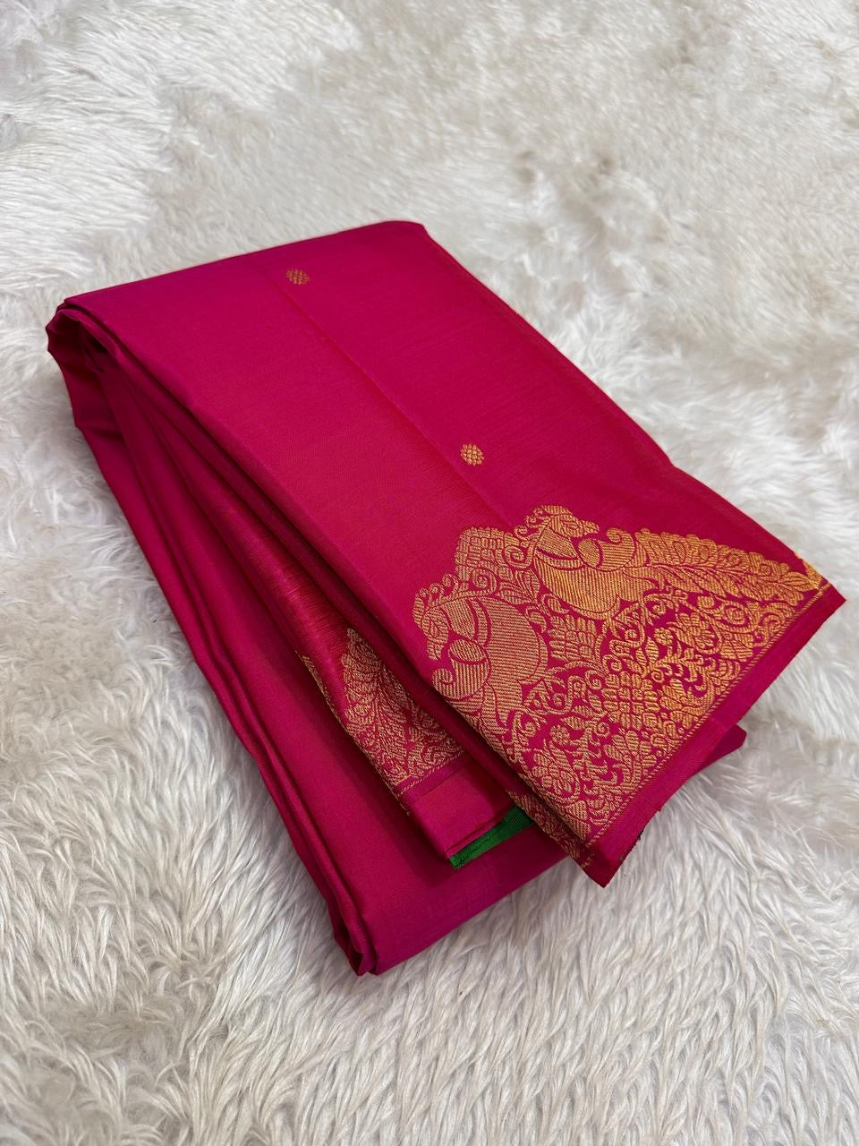 Raspberry pink Pure Silk Kanchi Pattu saree with self-toned Butta border