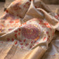 Pearl Ivory pure silk Kanchipuram Butta saree with intricate multicolour floral zari jaal.