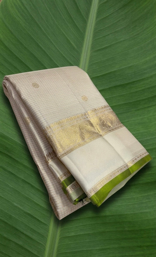 Vanilla ivory Kanchipuram silk saree with zari kattam checks and green selvedge