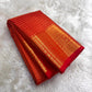 Exceptionally fine gold Zari Kattam with minute buttas on Sevappu Red silk.