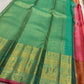 Raspberry-pink selvedge detail on aqua Kanchi Pattu Butta saree border