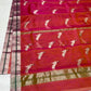 Orange-pink shot colour body close-up showing bird motifs